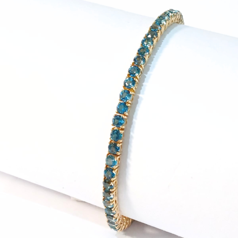 Pulseira Riviera em ouro 18k , com 61 pedras .